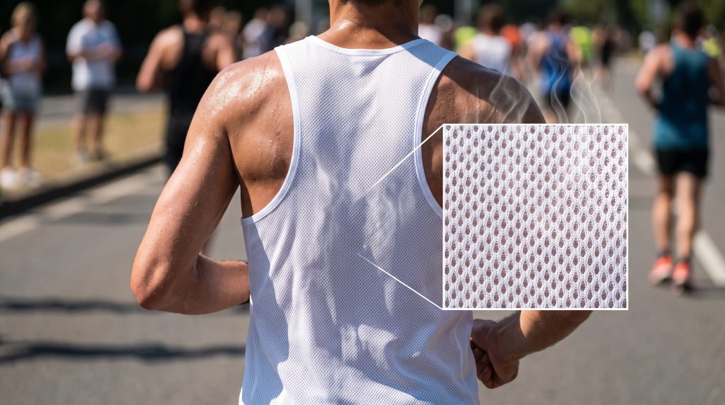 A macro close-up of Birdseye pattern knit fabric showing sweat vapor escaping through minute diamond-shaped apertures during strenuous exercise, illustrating passive ventilation.