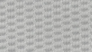 Close-up texture detail of white performance birdseye jersey fabric KWC0001, breathable knit structure.