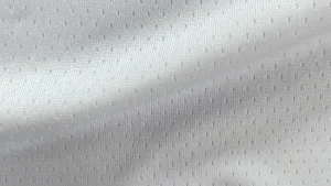Draped white 100% polyester medium-heavy 24-gauge dotted mesh fabric, structured pin dot texture, item SY9009, 180-190gsm