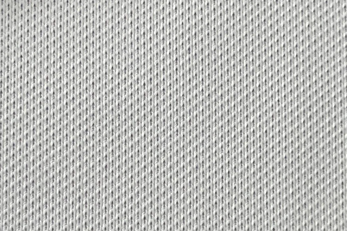 Close-up texture detail of white stretch fine micro-knit activewear jersey fabric KWC0008, 185gsm.