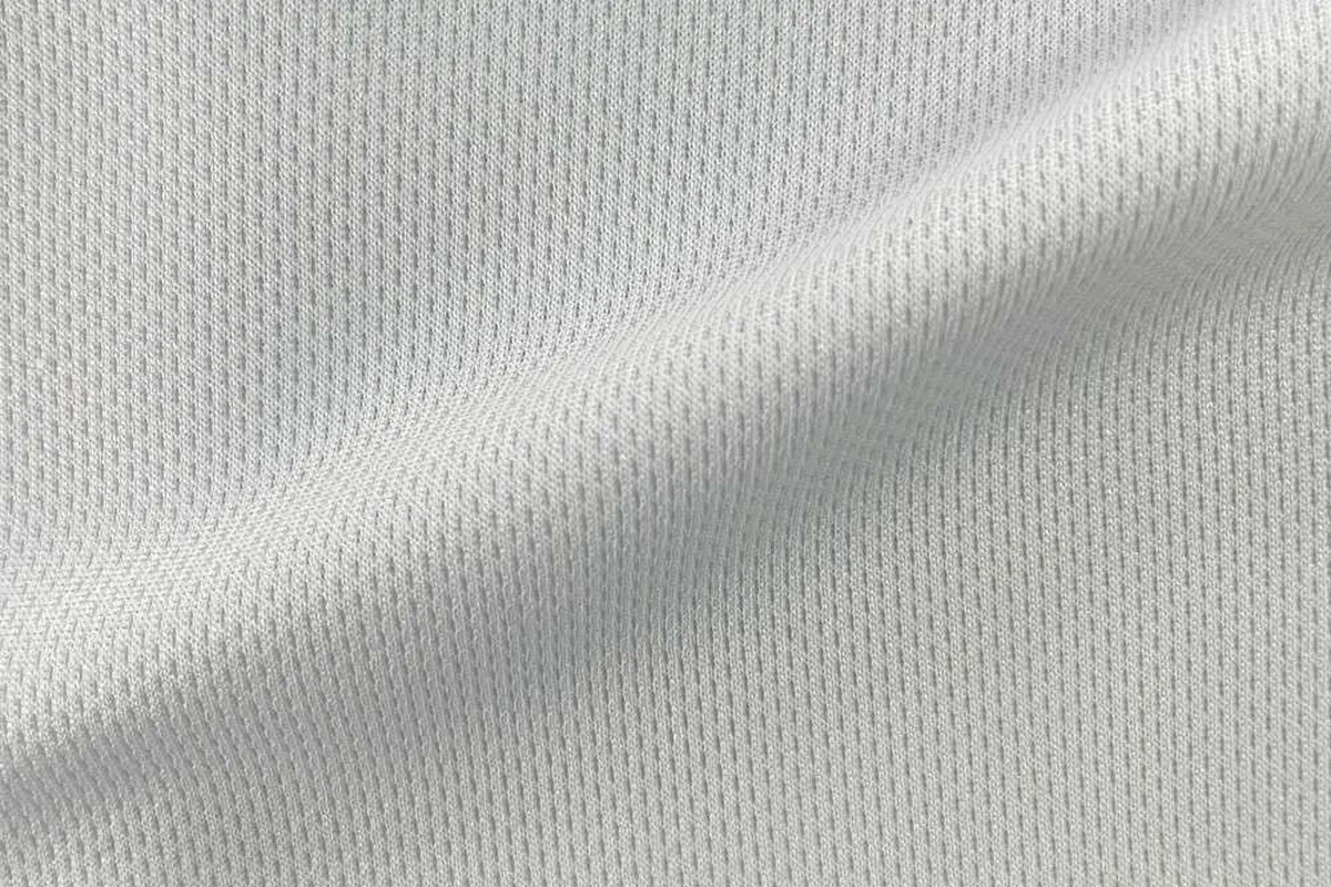 Draped white 100% polyester medium-heavy weight high-density birdseye mesh lining fabric, item SY2917, 195gsm