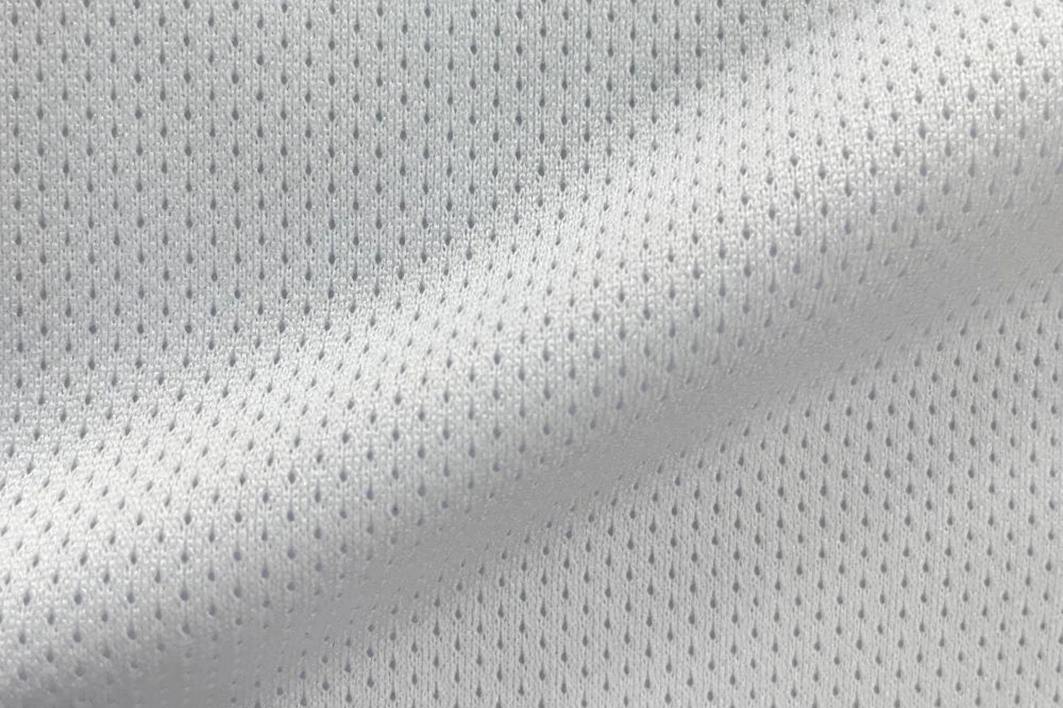 Draped white 100% DTY polyester lightweight birdseye pin dot mesh lining fabric, item SY185, 120gsm