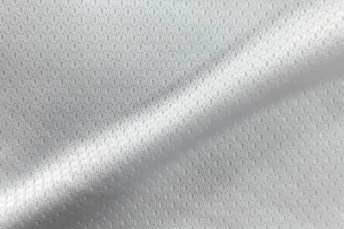Draped white 100% polyester light-medium weight staggered oval mesh lining fabric, modern athletic netting, item SY3229, 150gsm