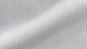 Moisture-wicking mesh lining fabric close-up for high-performance sportswear