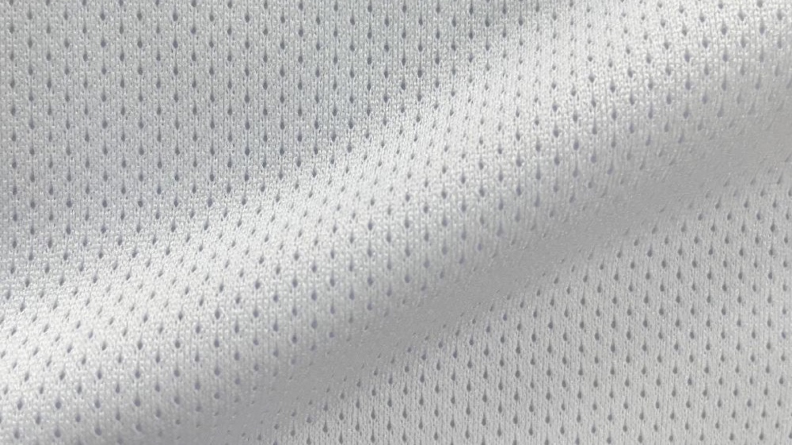 Moisture-wicking mesh lining fabric close-up for high-performance sportswear