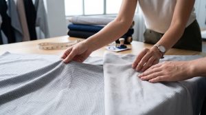 Comparing Birdseye mesh and Pique knit fabric structures side-by-side to select a reliable sports fabric wholesale supplier for activewear manufacturing.
