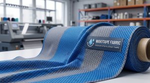 A high-quality roll of textured sports jersey fabric in a studio setting, showing technical mesh patterns.